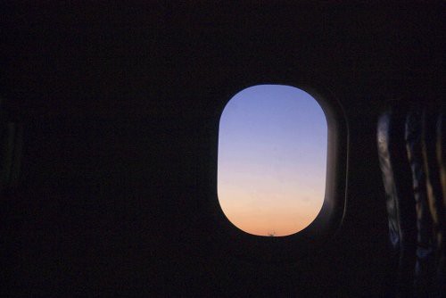 Airplane Window at sunset