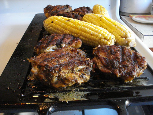 Chicken and corn on grill