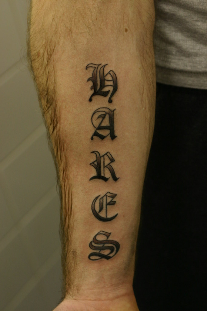 old english lettering shaded tattoo, forearm