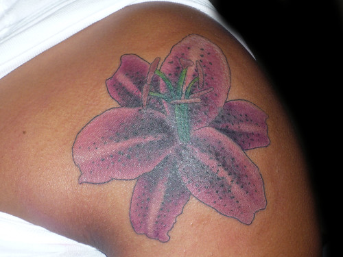 lilly tattoo on shoulder by Lucky Bamboo Tattoo
