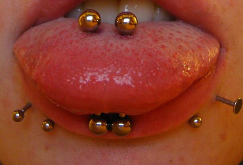 Piercings. Snakes. Swollen. Tongue.