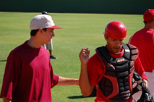 A catcher giving some pointers to the pitcher he had just caught.
