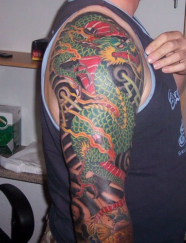 Full Arm Tattoo by Classic Ink