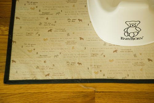 finn's room :: iron-on vinyl fabric mat to protect floor under baby potty