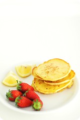 Rough Cottage Cheese "Pancakes" with Lemon and Strawberries for Breakfast