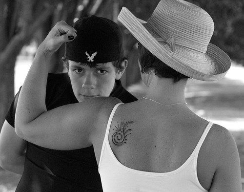 Thems some ig guns, Mom! My friend Michelle hammin it up for the camera to show off her new tattoo. AND, of course her son was more than willing to join in