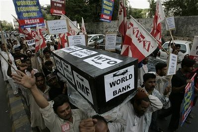 Supporters of the Pakistani religious party Jamat-i-Islami hold a protest rally in Karachi, Pakistan on Thursday, April 2, 2009 as world leaders from the G20 countries gather for a summit at the ExCel centre, in London's Docklands. by Pan-African News Wire File Photos