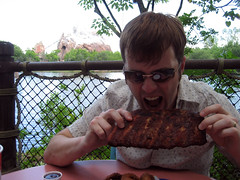 ian chowing down on some ribs at animal kingdom