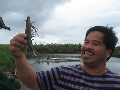 Tito Ompong with a tiger prawn