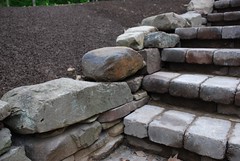 Stone wall and cobblestone steps