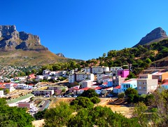 The colourful houses of Bo-Kaap framed by Table Mountain and Lions Head