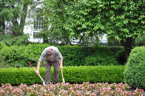 A Greenbrier employee tends the hotels grounds.