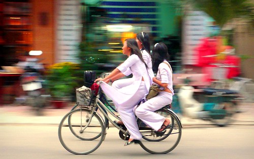 schoolgirls on bikes