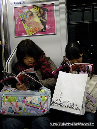 These two Japanese girls really love their magazines
