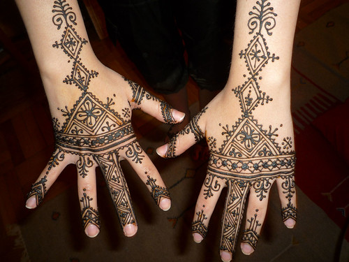  with beautiful henna designs on her hands palms and wrists she said it 