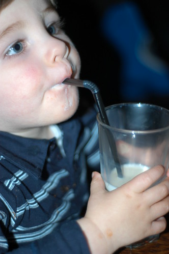 drinking milk with a straw