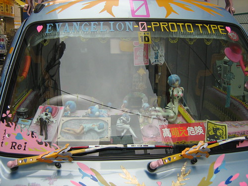 Lots of Rei Ayanami figurines in the Rei Ayanami car