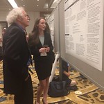 A student presenting her research