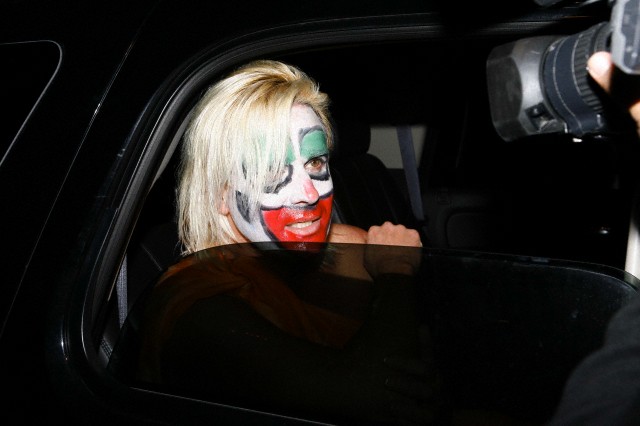 Daniel DiCriscio dressed as his former client Anna Nicole Smith is interviewed by Paparazzi on Halloween