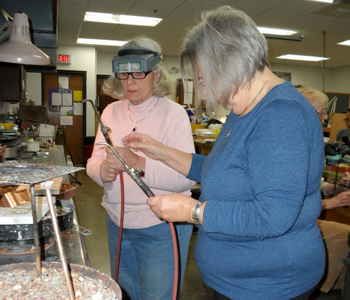 Judy Warren and Marian Corley work together in class at Joliet Junior College.