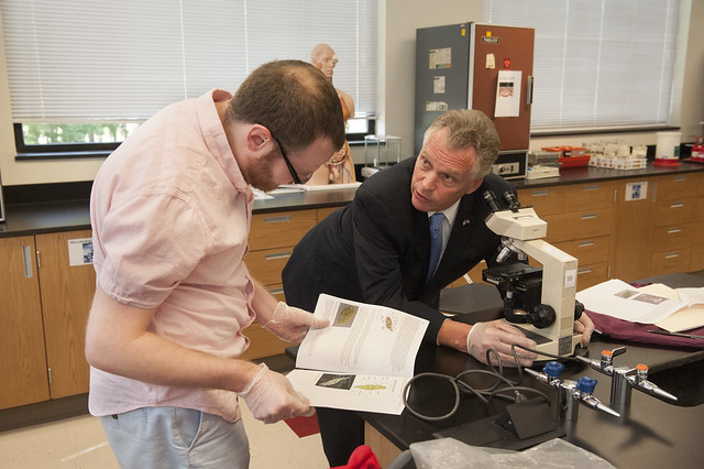 Terry McAuliffe talks to a biology student at J Sergeant Reynolds Community College