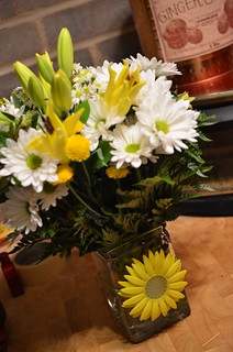 Yellow and White Flowers in Glass Vase