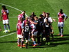 Referee Mark Clattenburg tries to sort out a row between Aston Villa and Hull City players after a foul on Jack Grealish, as Carlos Sanchez (24) and Aly Cissokho (23) look on
