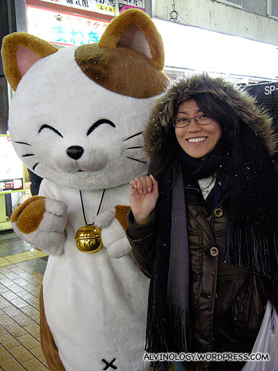 Posing with someone in a neko suit who happened to walk pass us