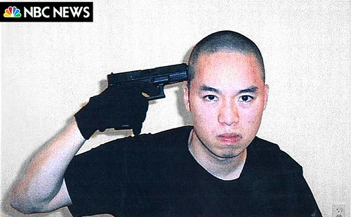 Image of Cho Seung-Hui with a gun to his own head