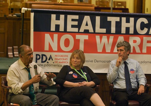 Rep. John Conyers, Donna Smith, & Norman Solomon talking about Healthcare not Warfare at the DNC