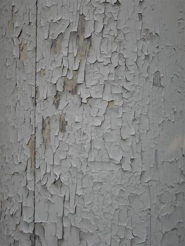 Cracked exterior white paint