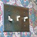 Oxidized metal light switch cover