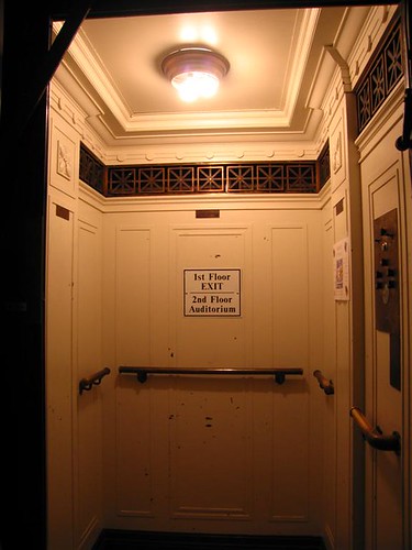 Old elevator car in West Hall