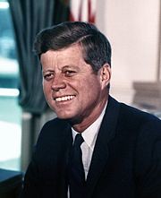 180px-John_F._Kennedy,_White_House_color_photo_portrait