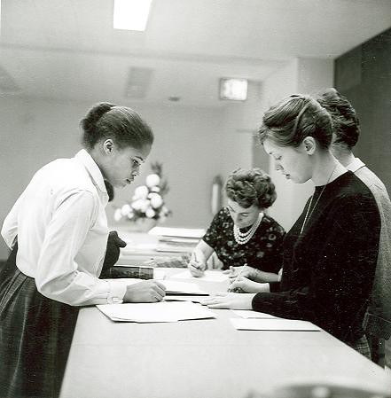 Student Life, McEntegart Hall (02) - A student is being helped at the circulation desk