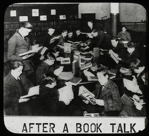 Work with schools : after a book talk, showing boys gathered...