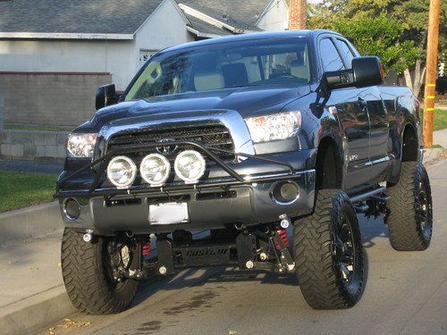 Lifted Tundra with oversize wheels.