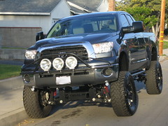 Front end view of custom lifted Tundra.