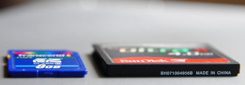 Thickness comparison -- Transcend 8GB SDHC Class 6 side-by-side with a SanDisk Ultra II 4.0GB CompactFlash CF memory card