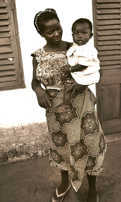Togo West Africa Beautiful Togolese African Mother and Daughter Village close to Palimé formerly known as Kpalimé is a city in Plateaux Region Togo near the Ghanaian border B&W Sepia 23 April 1999 005 Loving Mother and Daughter<br/>© <a href="https://flickr.com/people/41087279@N00" target="_blank" rel="nofollow">41087279@N00</a> (<a href="https://flickr.com/photo.gne?id=3237844834" target="_blank" rel="nofollow">Flickr</a>)