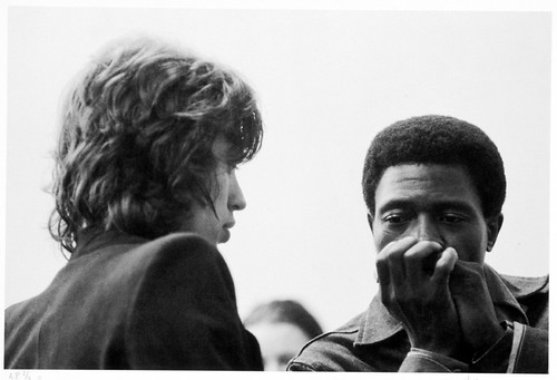 Junior Wells gives Mick Jagger a harmonica lesson. Berlin, Germany, October 1970