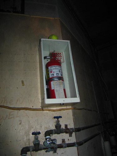 Unused fire extinguisher in a utility room