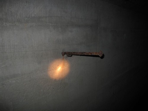 Steel anchor rod sticking out from wall