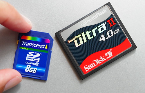 Size comparison -- Transcend 8GB SDHC Class 6 side-by-side with a SanDisk Ultra II 4.0GB CompactFlash CF memory card