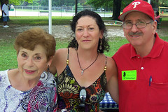 Elaine Herring-Hill (center) with parents Linda and Herman Herring (see Notes at right)