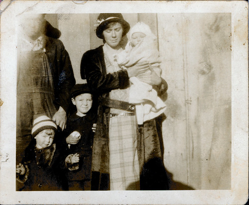 Man and woman with baby and two children