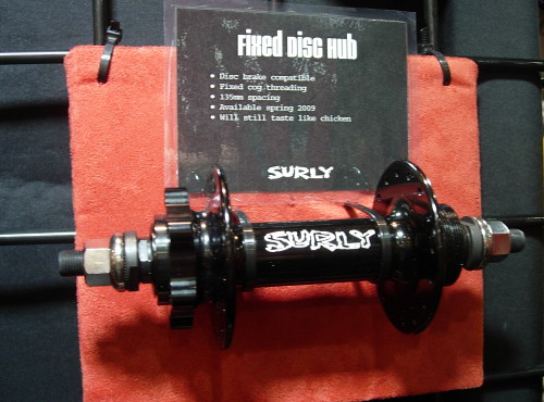 Surly Fixed Disc bike hub - black - front, horizontal view with a specification tag above it