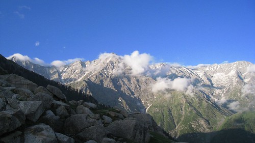 Indrahar Pass is the lowest point on the ridge to the left of the main peak
