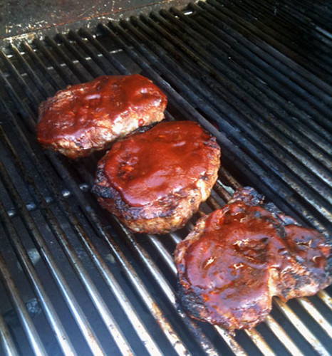 Ribeye steaks on grill