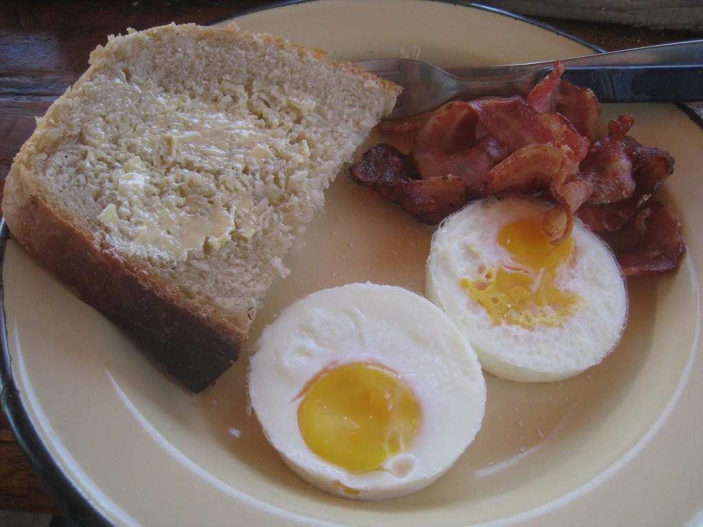 Breakfast at Bulungula includes Xhosa-style bread made using solar power, eggs, and hearty slices of bacon.